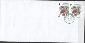 MOTYLE I KWIATY ALDERNEY KOPERTA